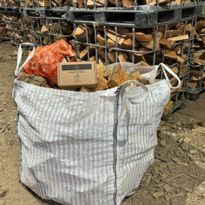 A Large Bulk Bag of Mixed Firewood, a Bag of Kindling and a Box of Firelighters