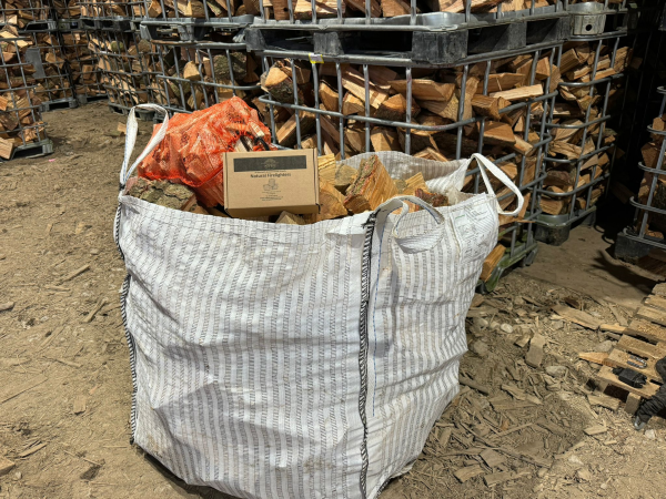 A Large Bulk Bag of Mixed Firewood, a Bag of Kindling and a Box of Firelighters